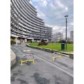 High-resistance spring-loaded parking bollard