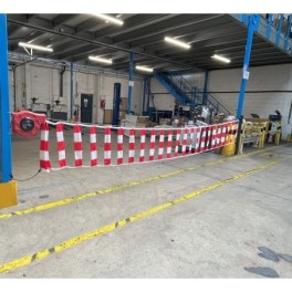 Retractable barrier reel with signaling belt