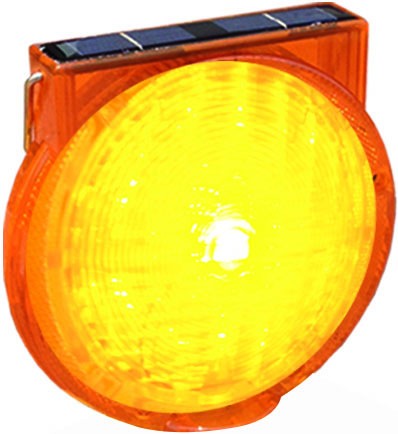 Solar-powered LED flashing construction lamp with interlocking feature